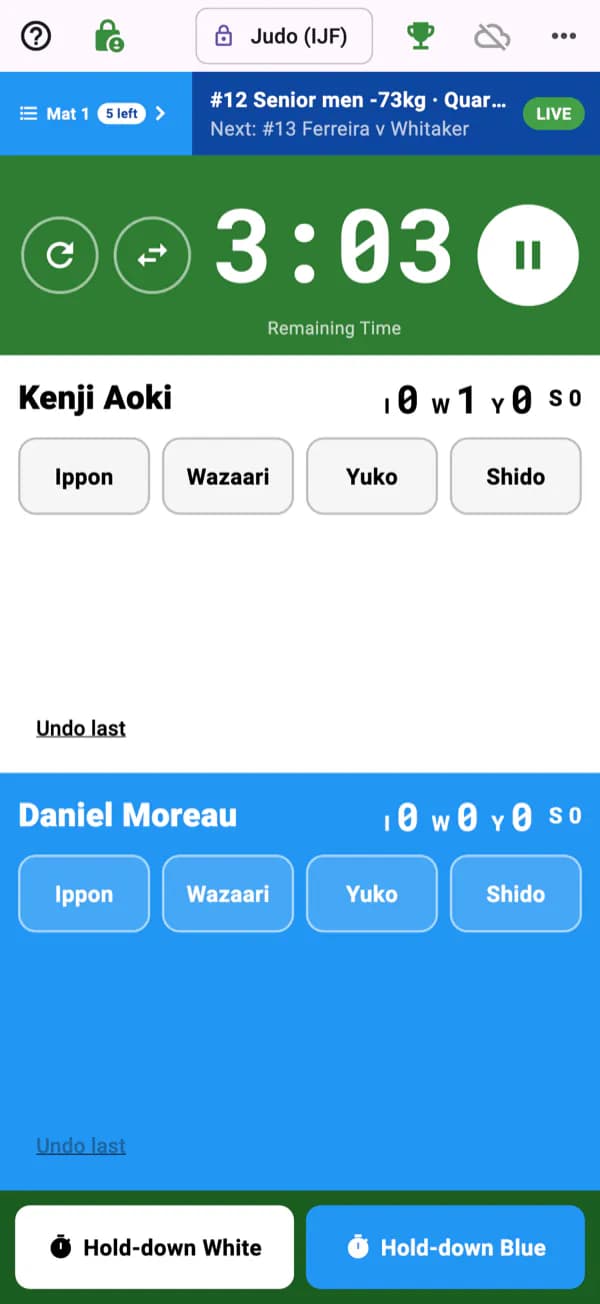 IpponBoard on an iPhone scoring a judo bout: 3:03 on the clock, Ippon, Wazaari, Yuko and Shido buttons for each competitor and hold-down buttons at the bottom